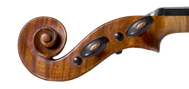 Scroll of the violin by G.B. Guadagnini being sold by Ingles & Hayday in November 2021